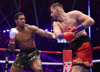 Joshua Survives Twin Knockdowns, Knocks Out Prenga in Round 2